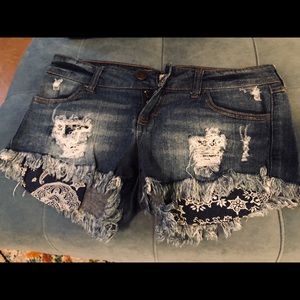 Vintage destroyed denim shorts